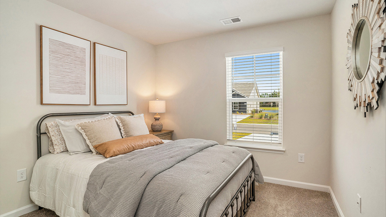 The two guest bedrooms and guest bathroom are separate from the living areas of the home.