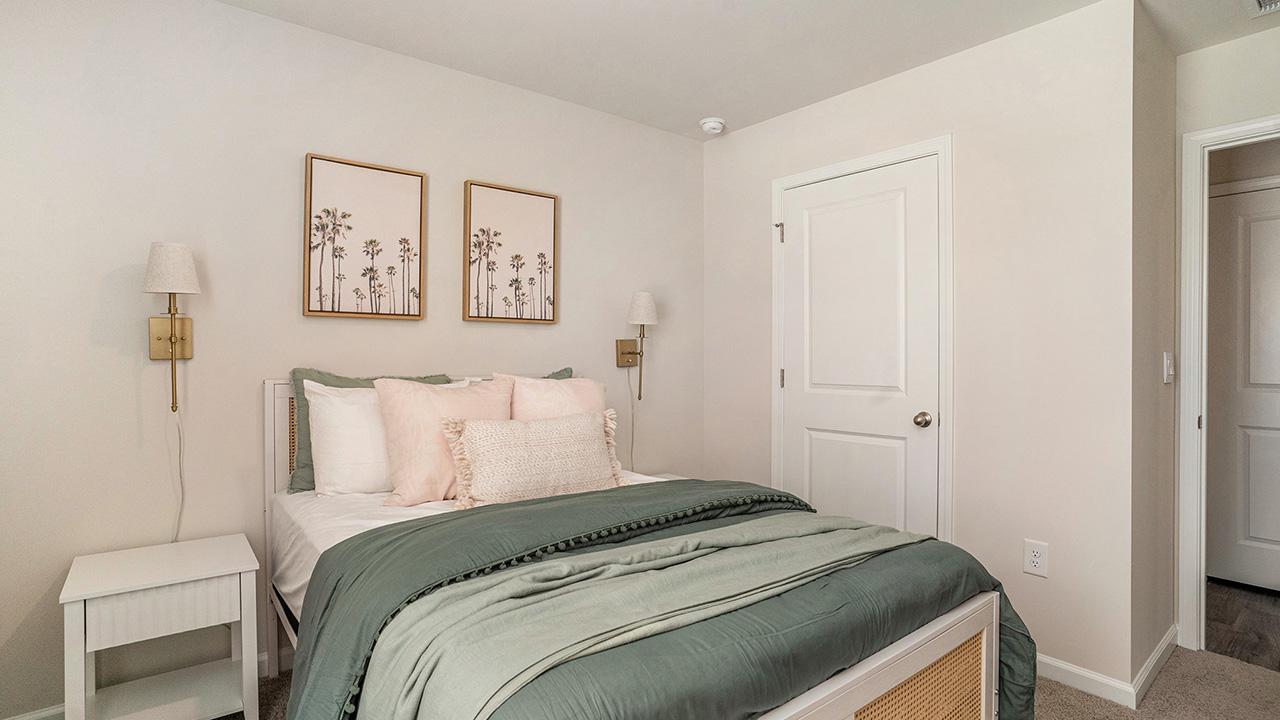 The two guest bedrooms and guest bathroom are separate from the living areas of the home.