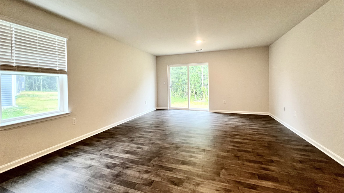 The kitchen flows perfectly into the sizeable living room.