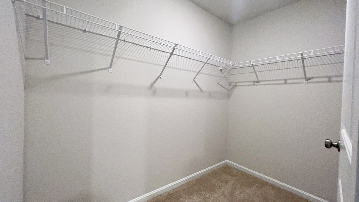 The owner's suite has a large walk-in closet.