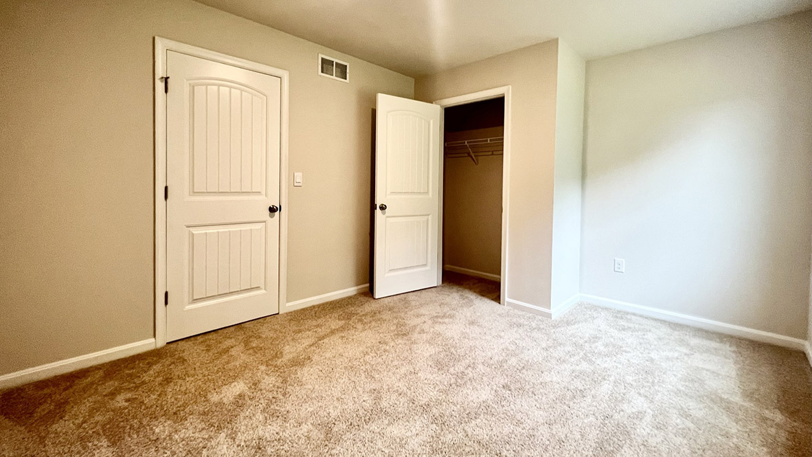 A first-floor, secondary bedroom that can be used for overnight guests, a home office, or a hobby room.