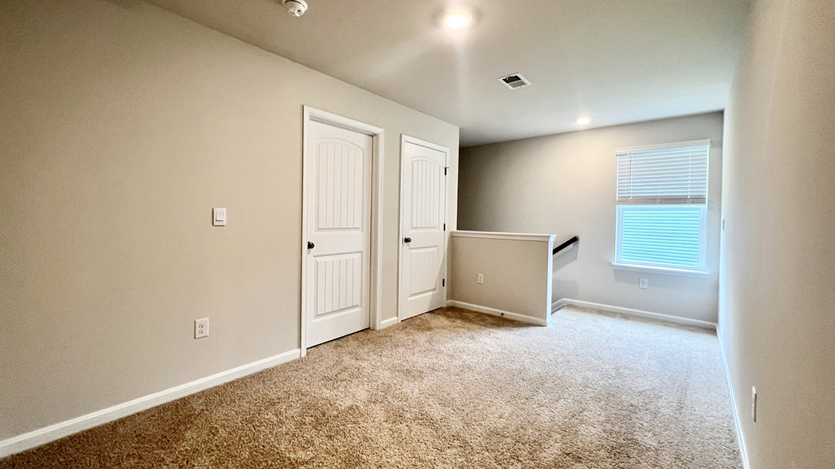Upstairs, you will enter the inviting loft.