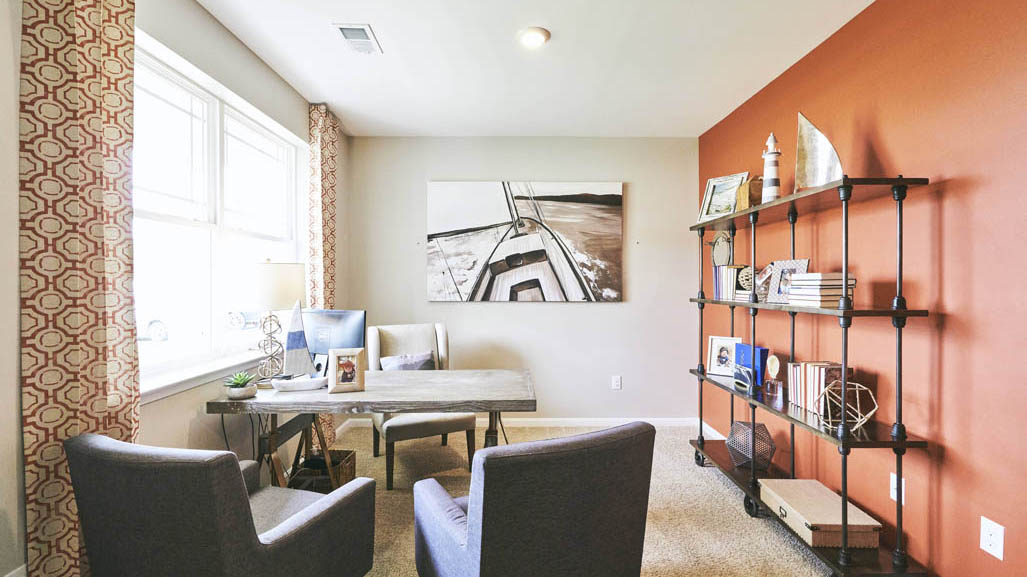 This well-designed home has an inviting foyer that is open to the functional flex room.