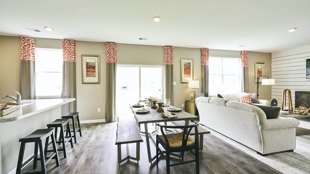 The kitchen flows seamlessly into the dining space and the sizeable great room.