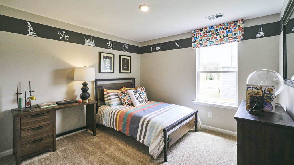 Three generously sized secondary bedrooms, and a spacious hall bathroom with double vanity complete the upstairs.