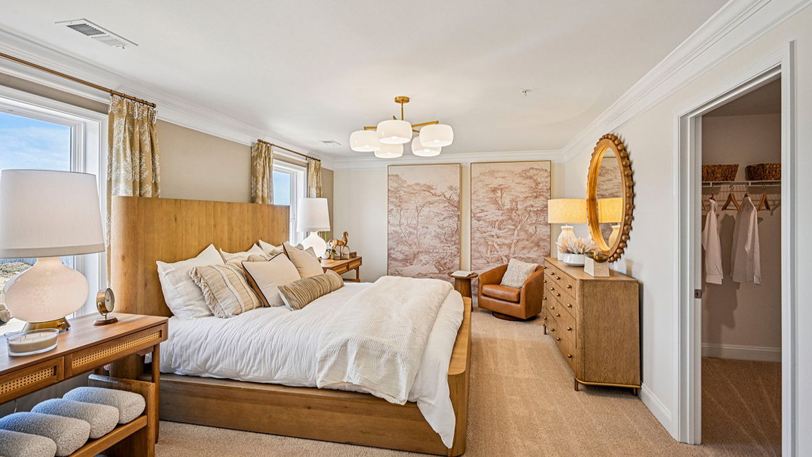 The impressive owner’s suite boasts an expansive bedroom with a huge walk-in closet.