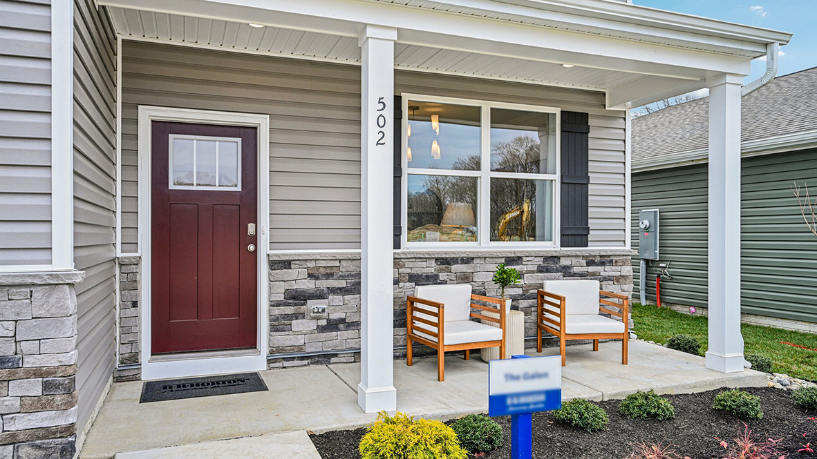 This well-designed home has an inviting front porch.