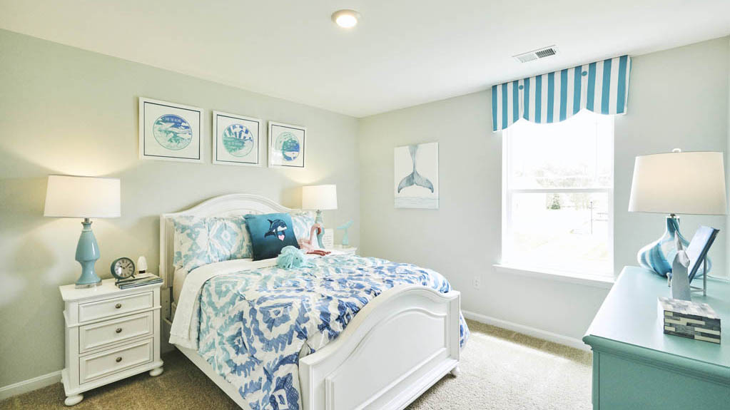 Three generously sized secondary bedrooms, and a spacious hall bathroom with double vanity complete the upstairs.