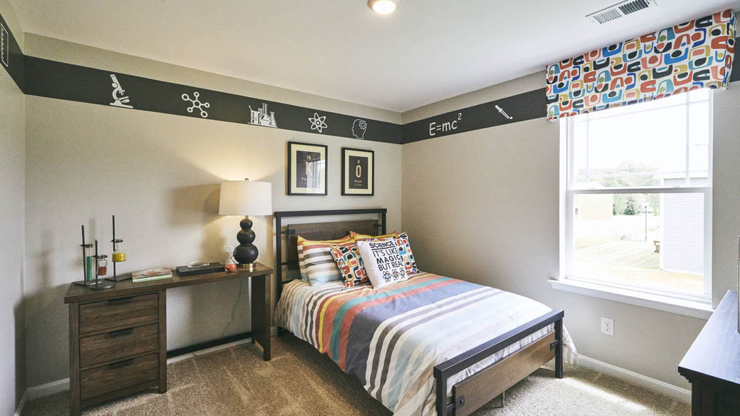 Three generously sized secondary bedrooms, and a spacious hall bathroom with double vanity complete the upstairs.