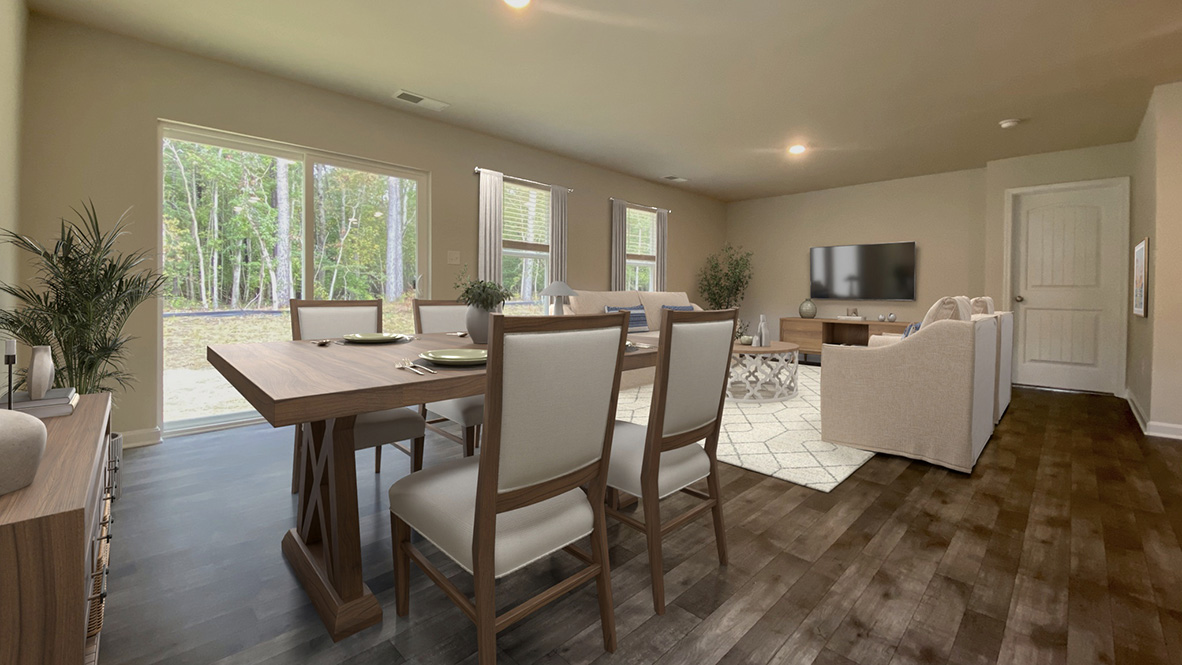 The living area has a sliding glass door to the backyard.