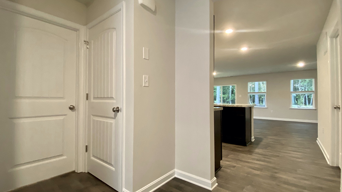 The foyer leads you to a coat closet on one side.