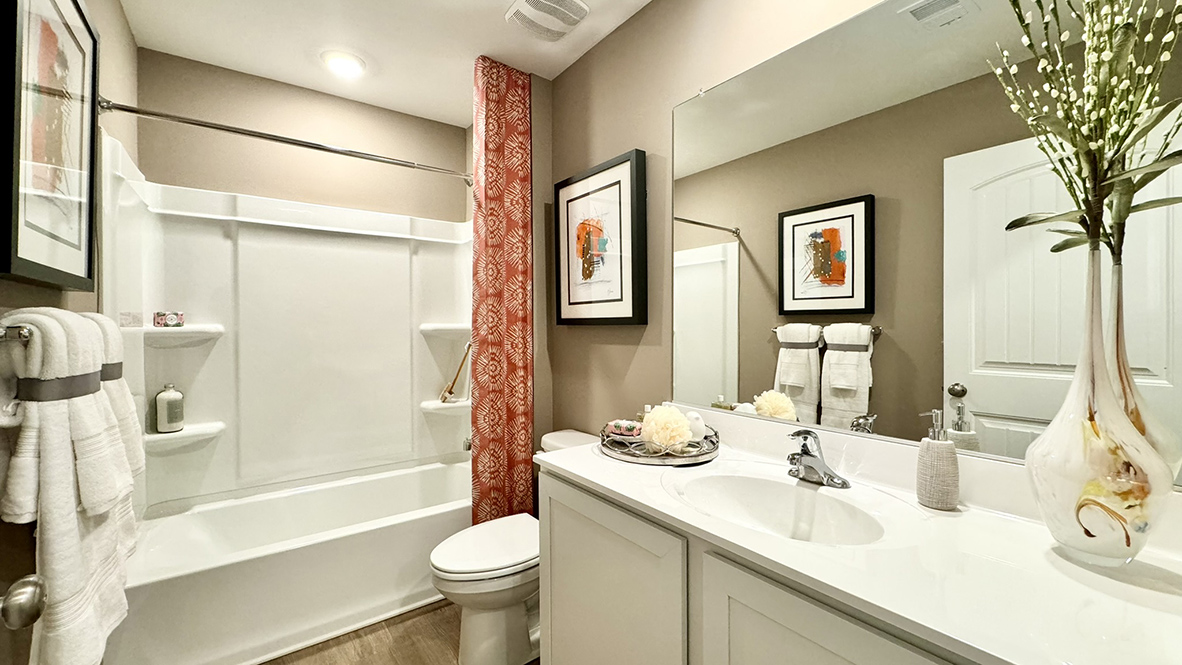 The guest bedrooms share a full bath.