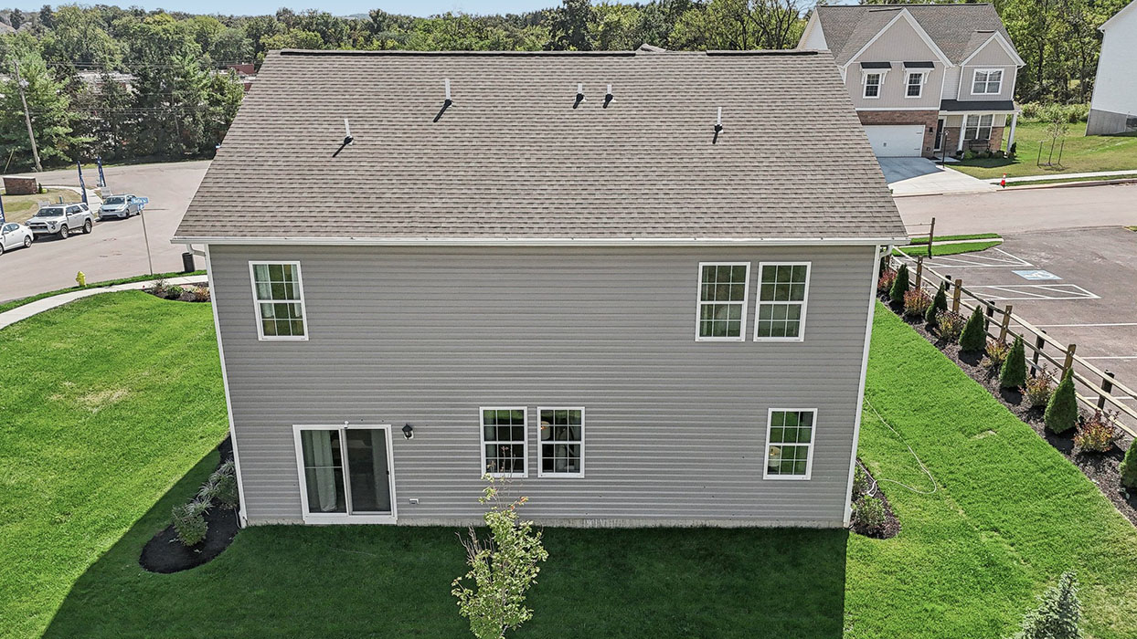The back of the Henley home showing a sliding glass door.