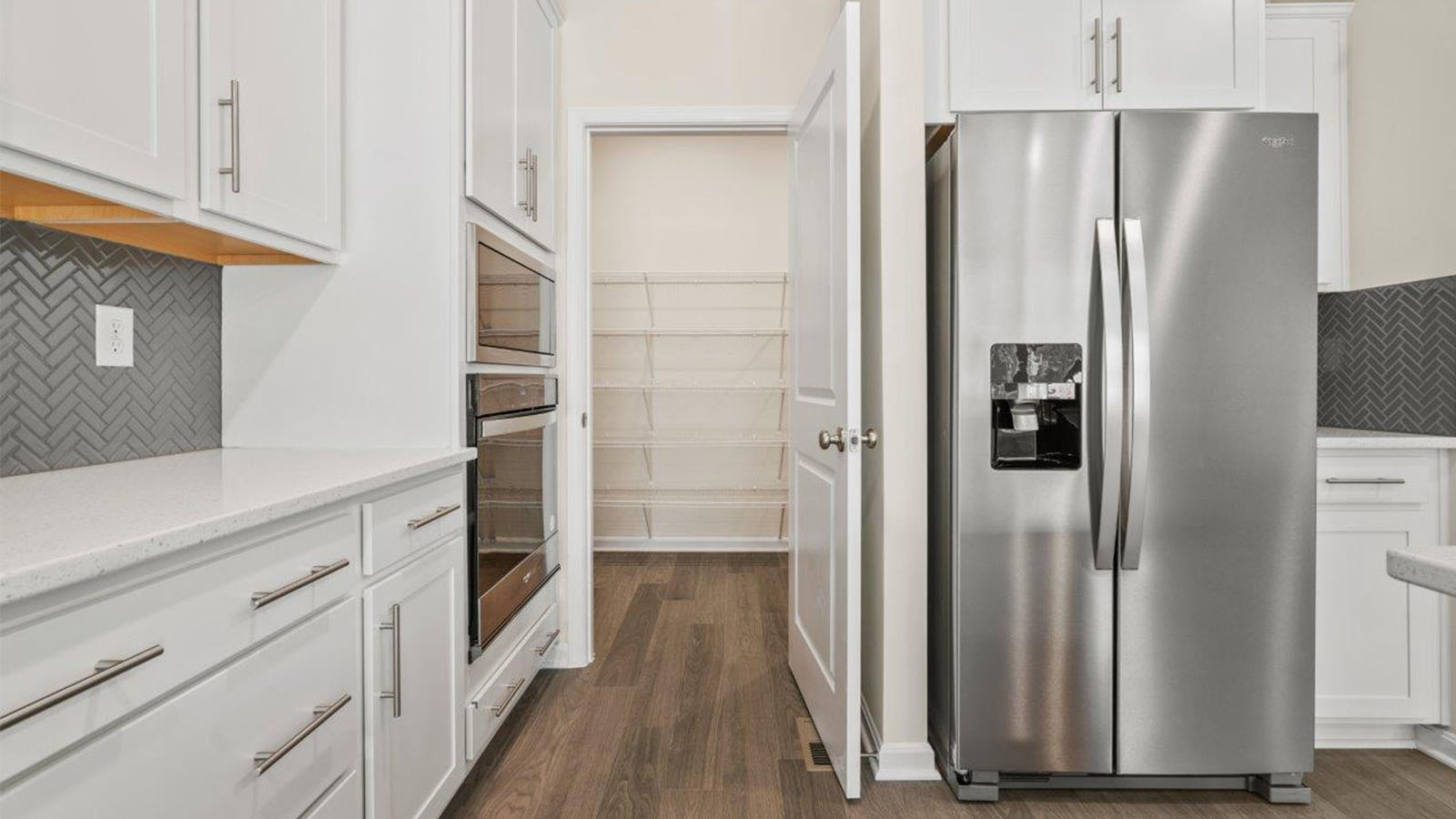 kitchen with stainless steel appliances and a walk in pantry