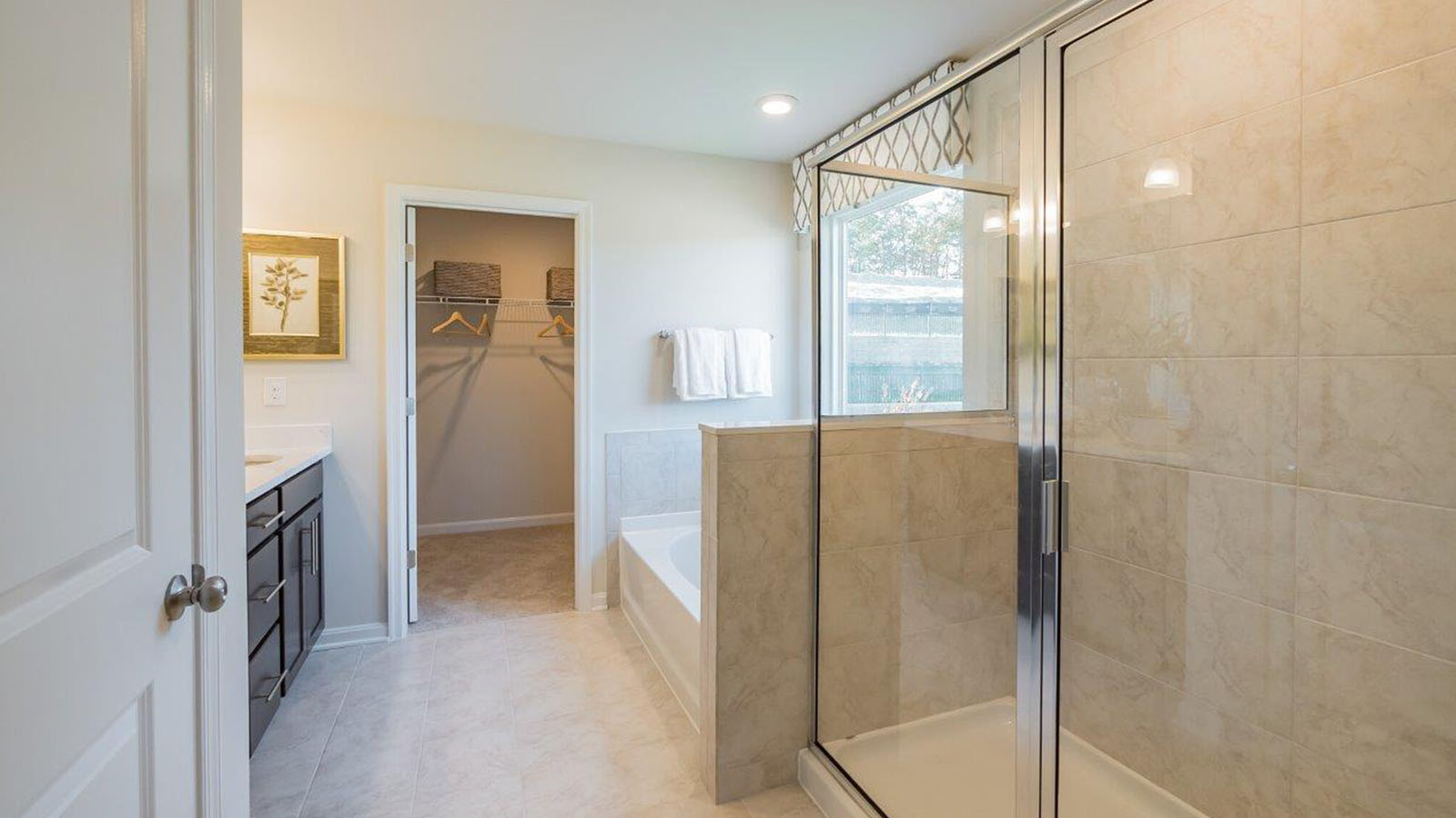 master bath with glass shower