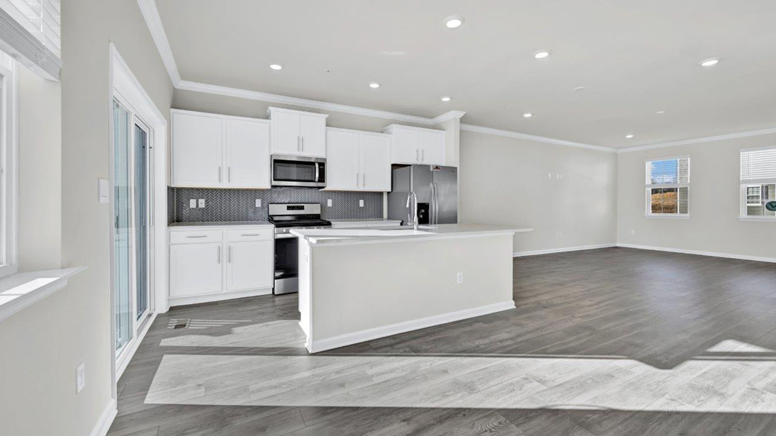 white kitchen with central island