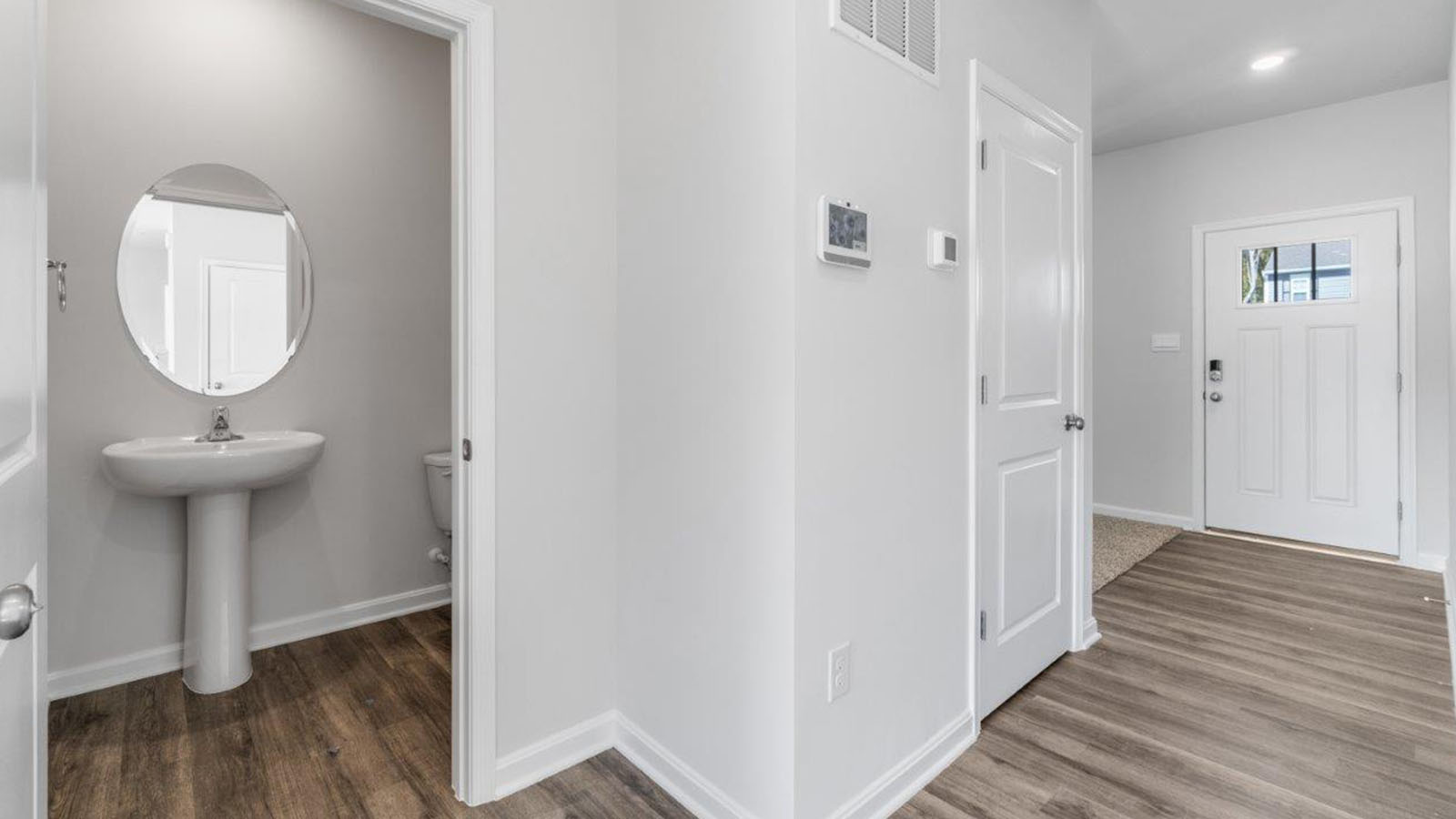 entry hallway with half bath