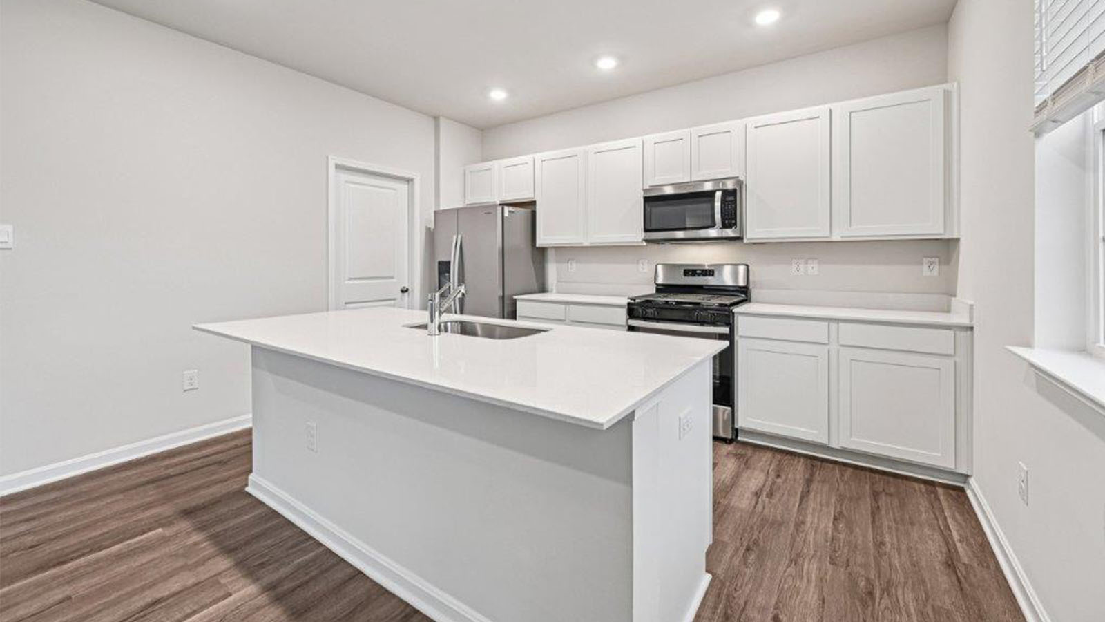 recessed lighting and corner pantry
