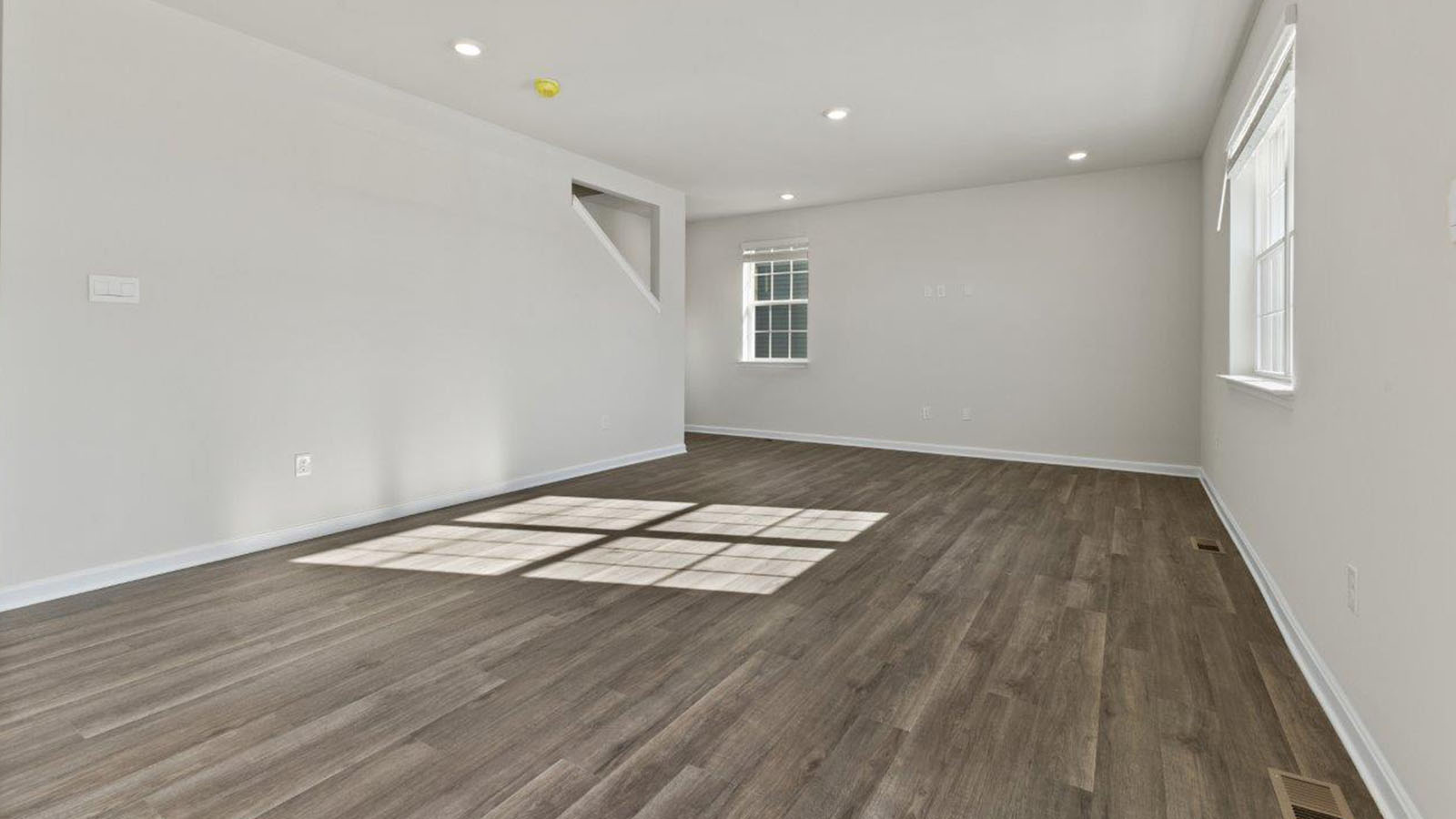 open concept living room with natural light