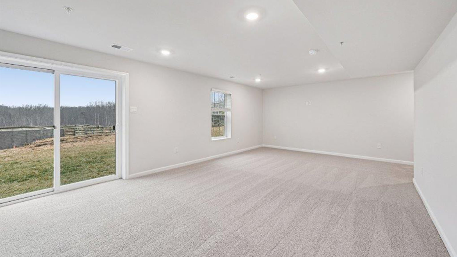 finished basement rec room with walkout door