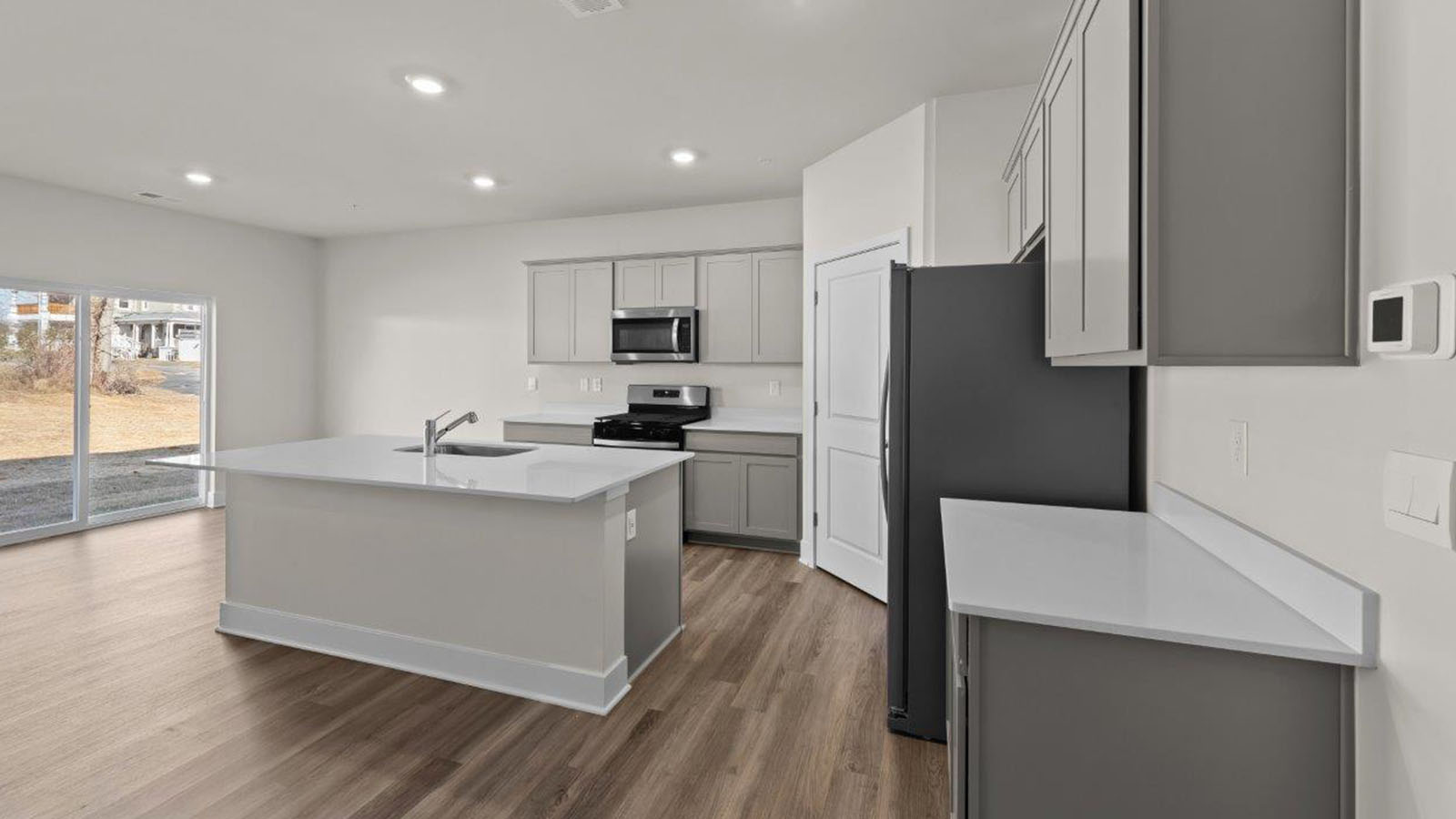 grey shaker style cabinets and quartz counters