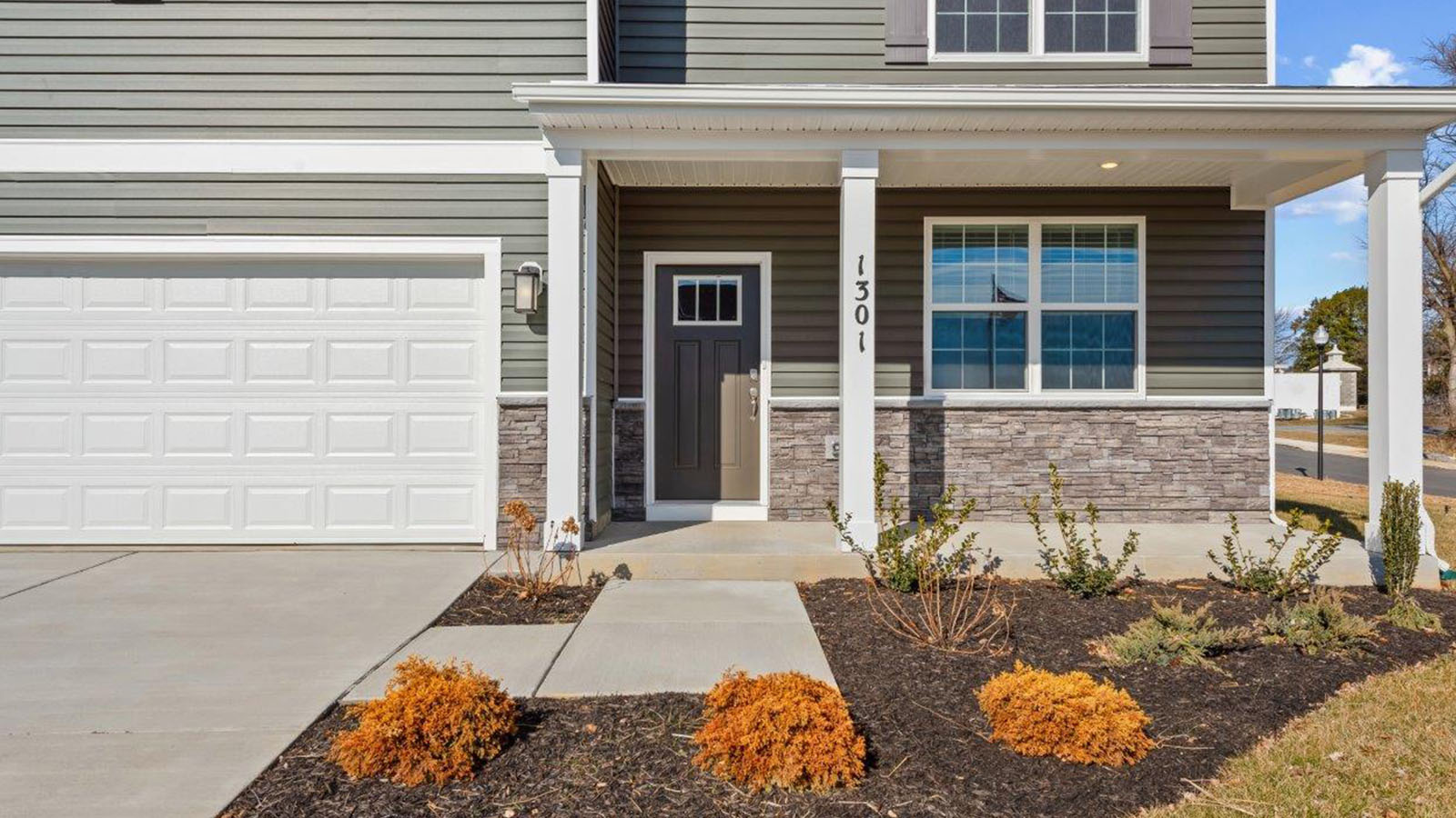 front porch and two car garage