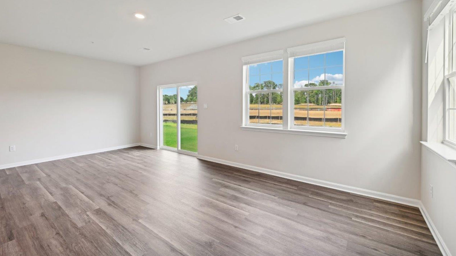 open concept living room with natural light