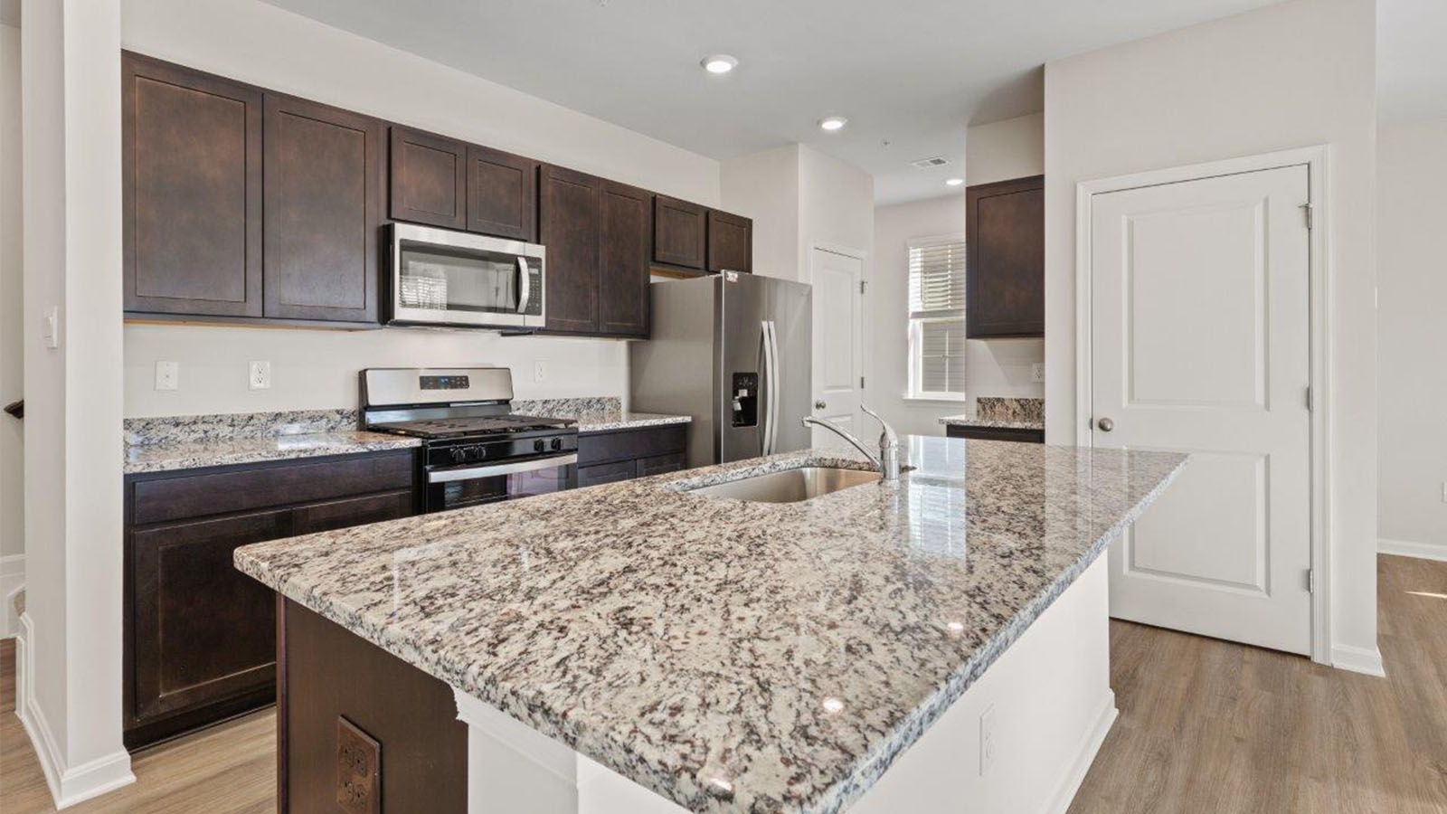 espresso shaker cabinets and granite counters