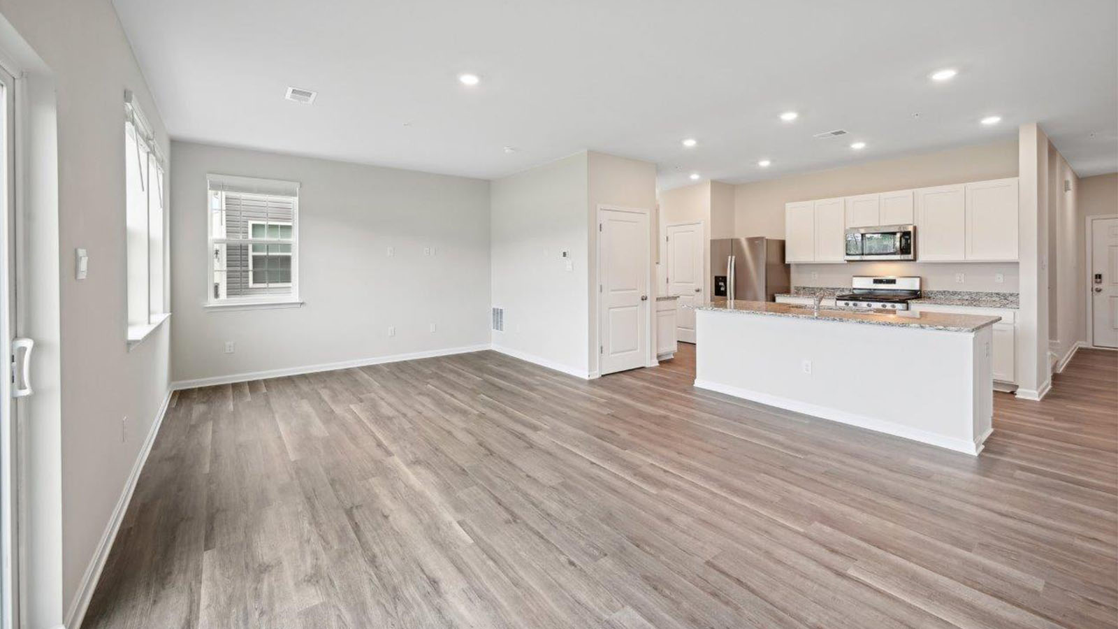 open concept kitchen overlooking living area