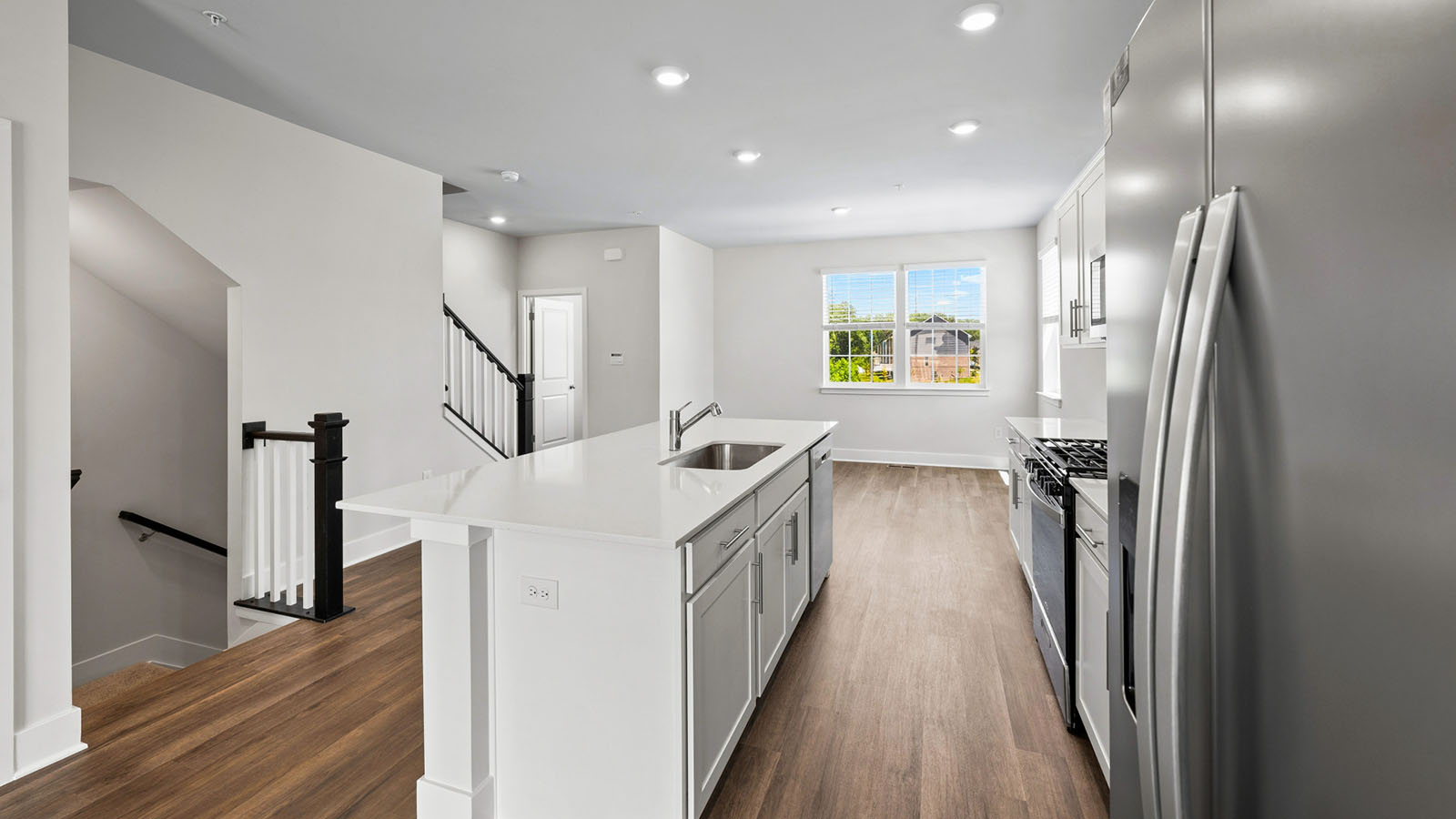 white shaker style cabinets and quartz counters