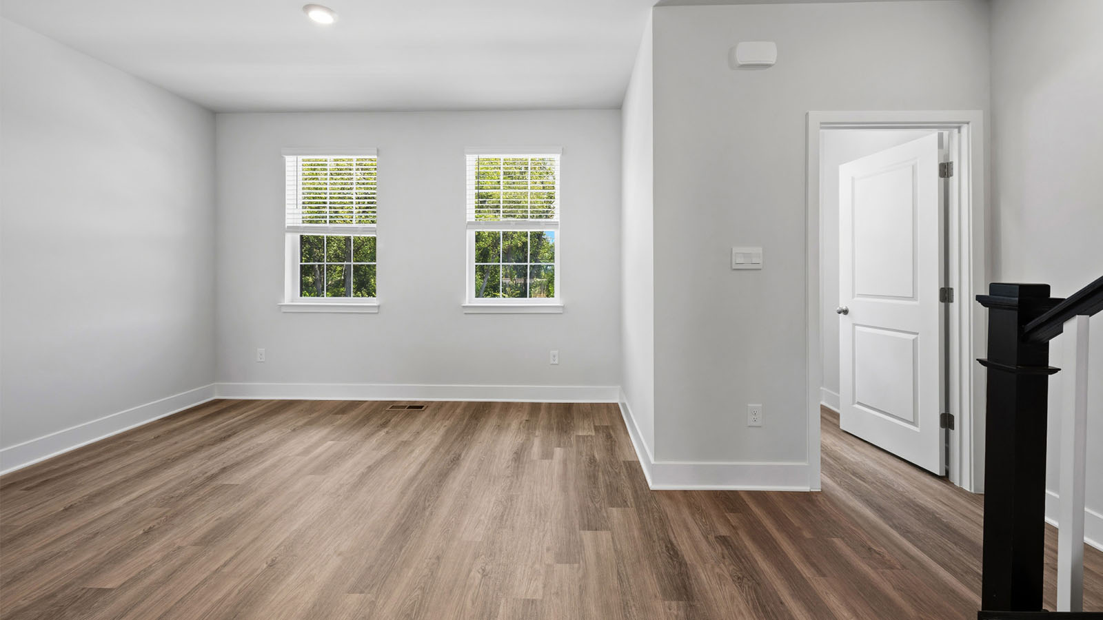 living area with luxury vinyl lank floors