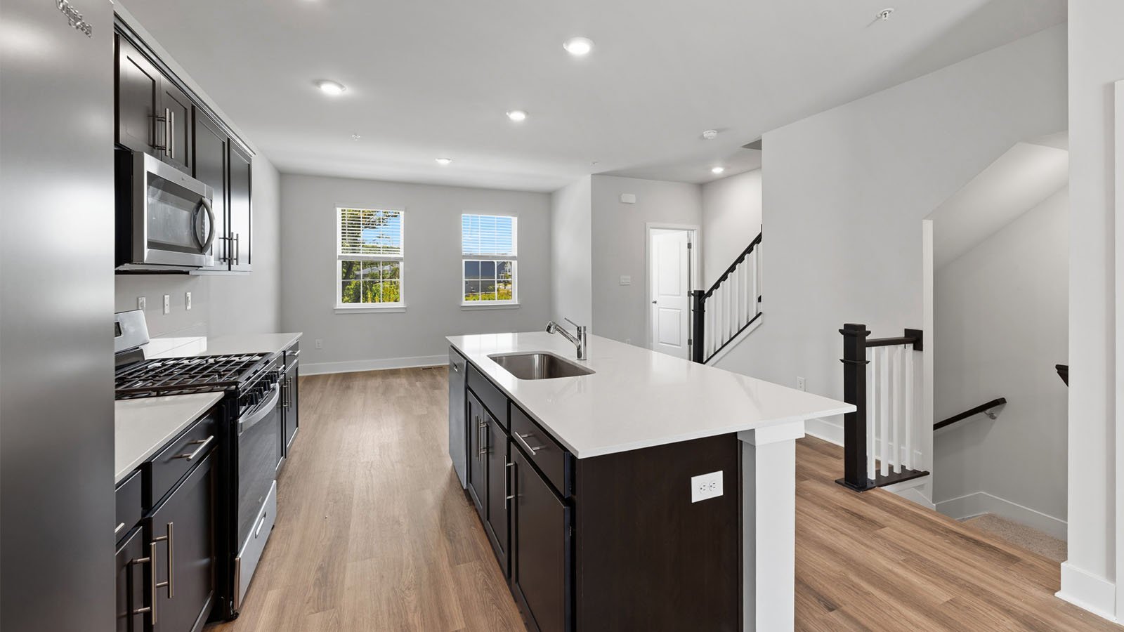 main level kitchen with espresso cabinets