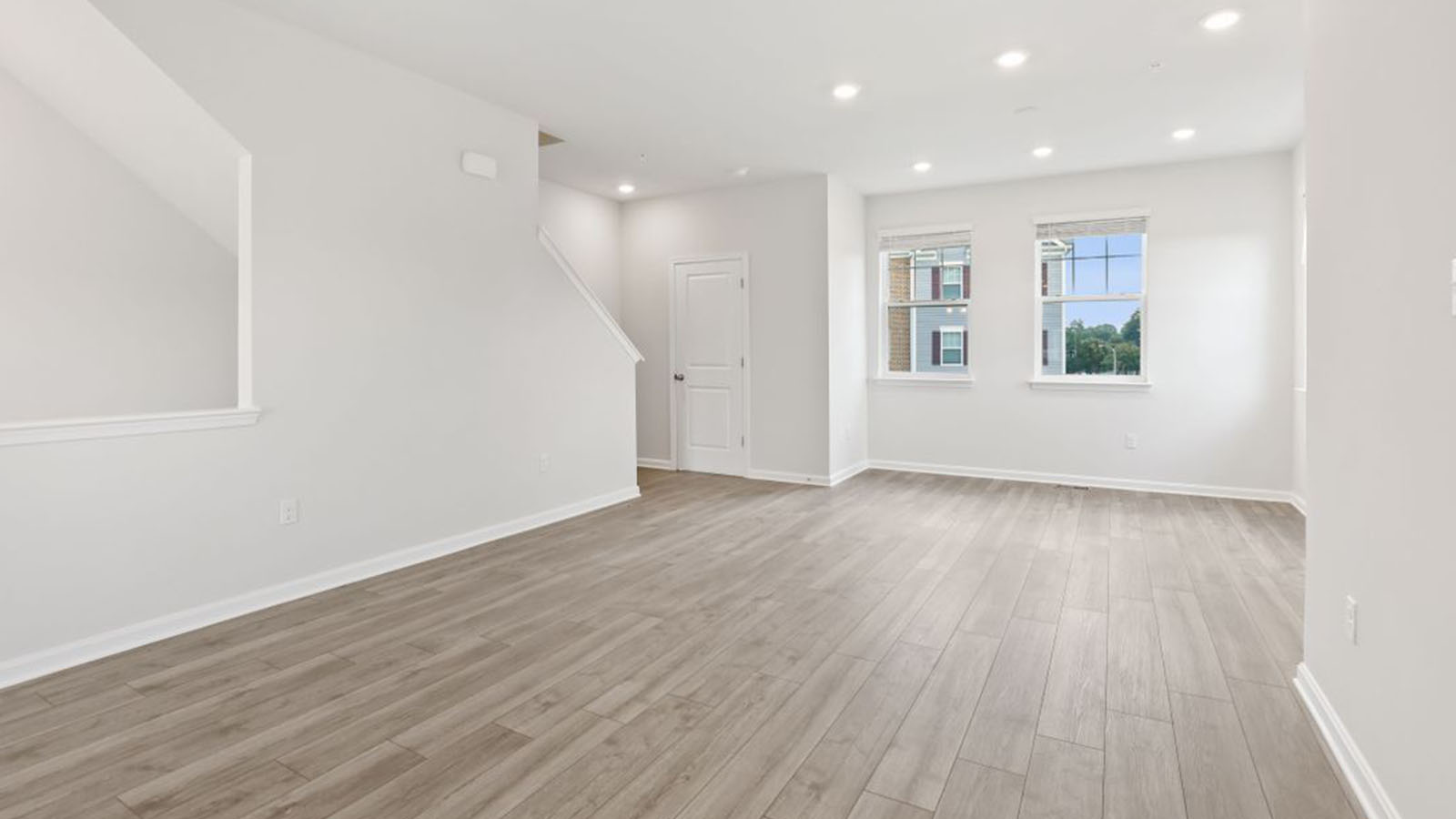 open living area with recessed lighting