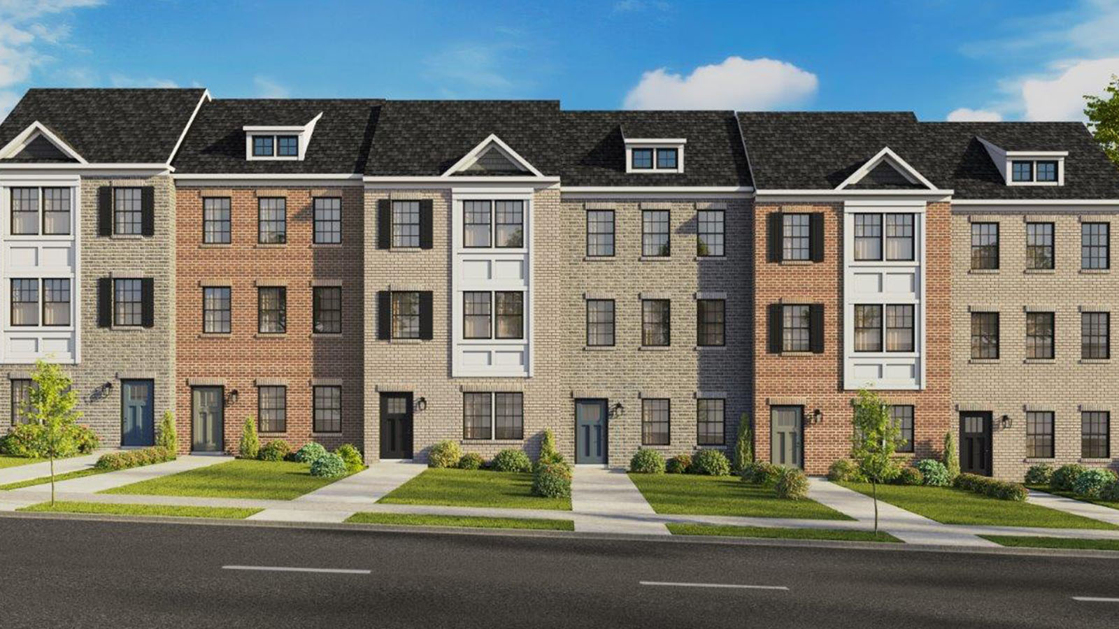 three story townhome with brick