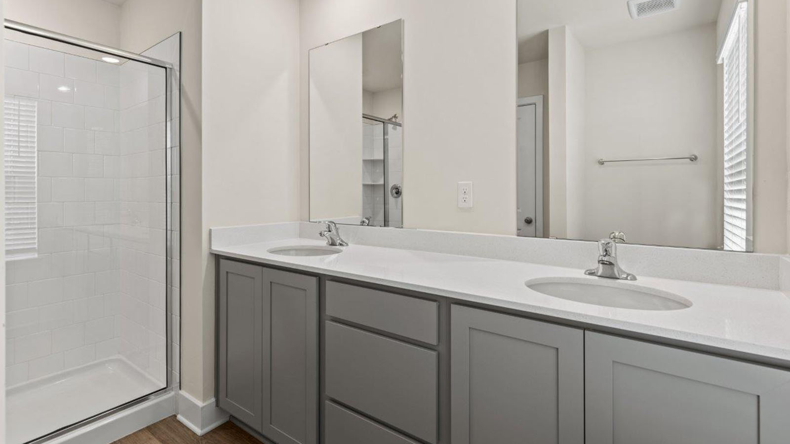 primary bathroom with dual sink