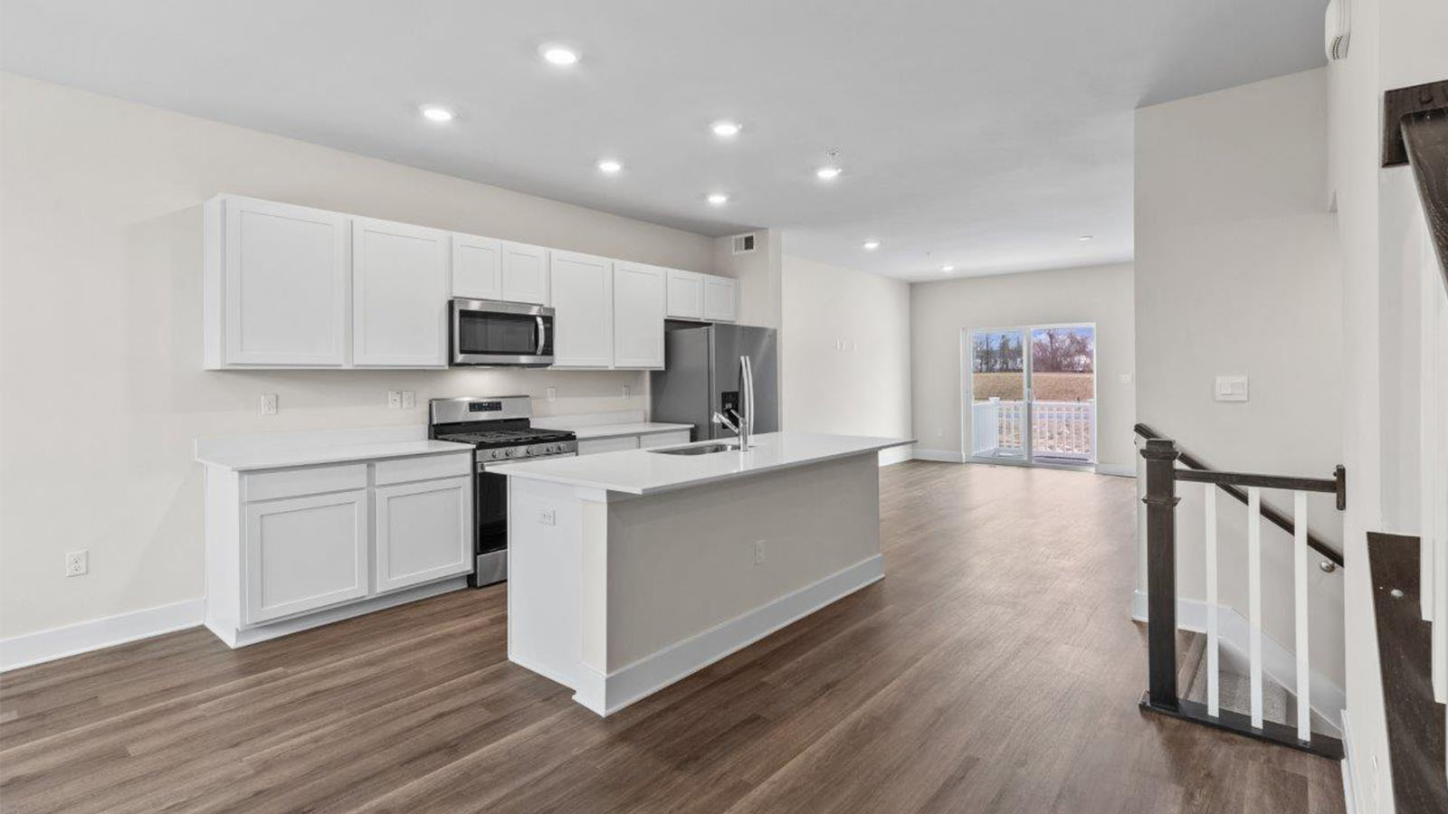 recessed lighting and luxury vinyl plank floors