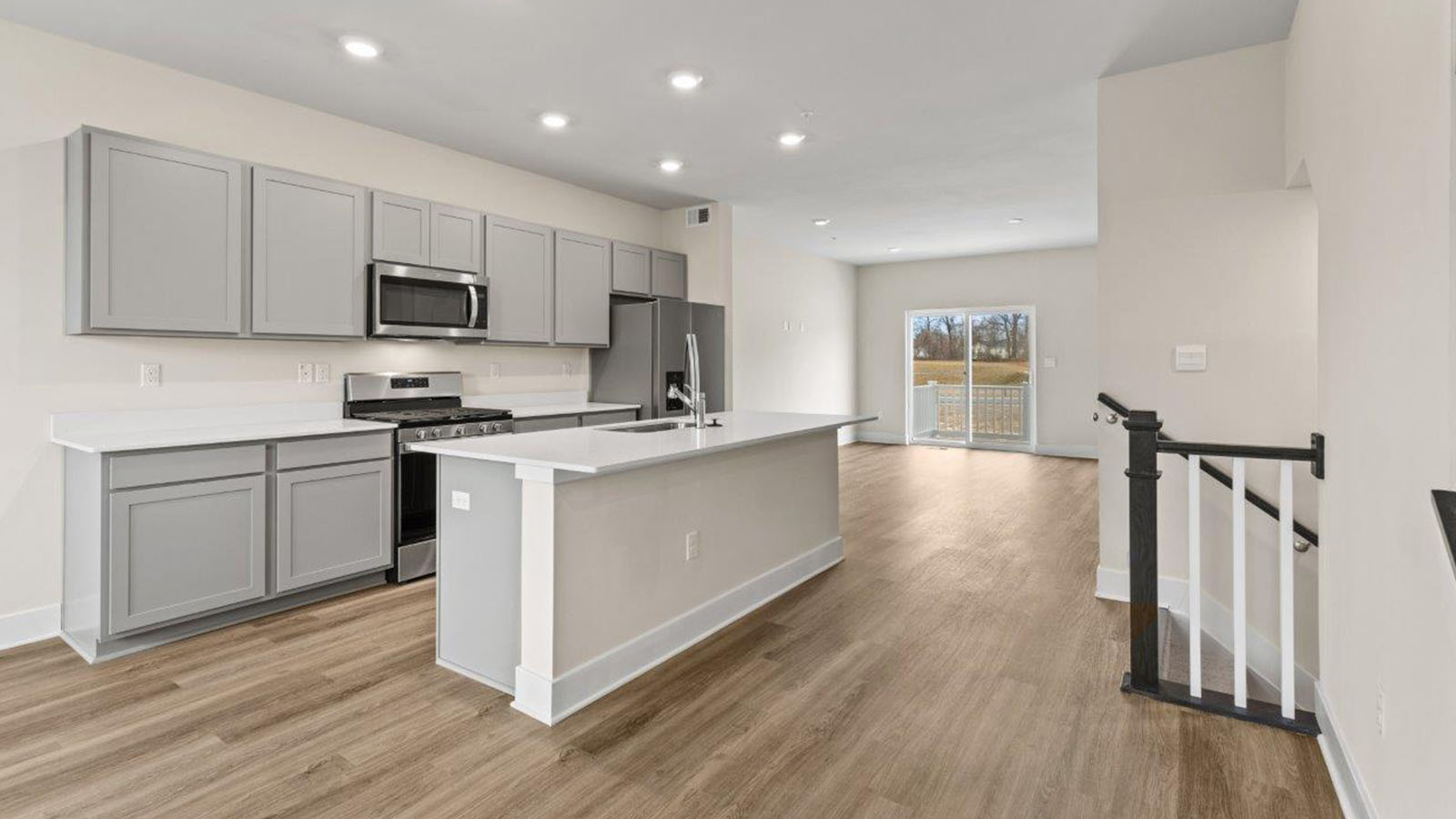 main level kitchen with grey shaker cabinets