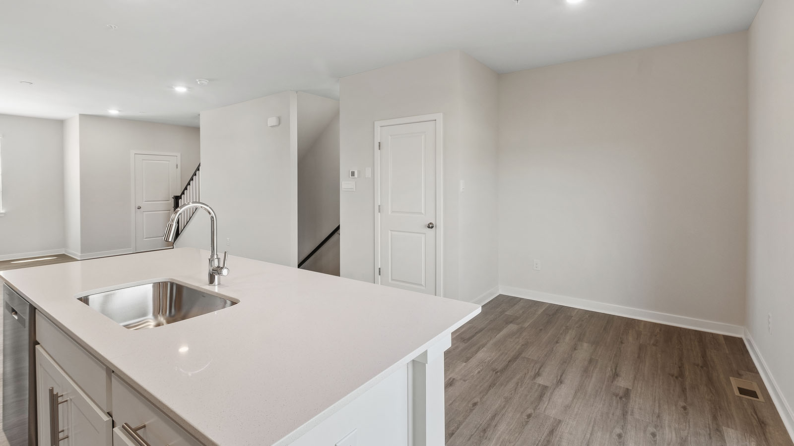 island with sink facing living area