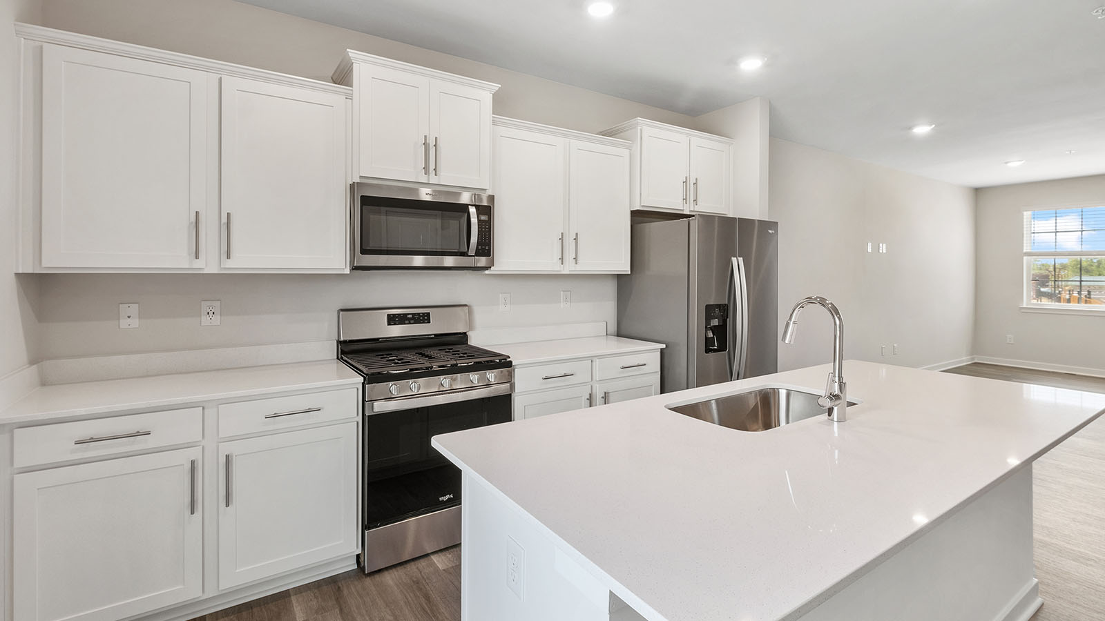 main level kitchen with white shaker cabinets