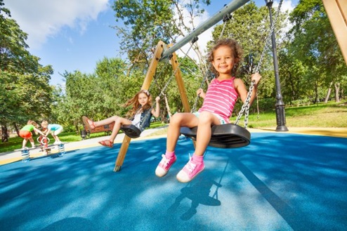 Kid on Swings