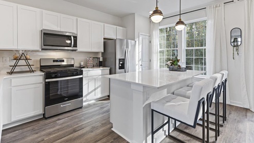 main level kitchen LED Lighting and stainless steel appliances