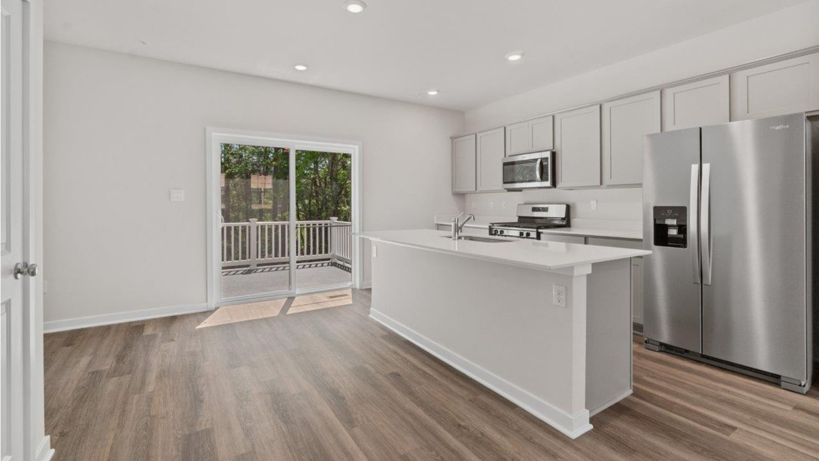kitchen leading to sliding back door