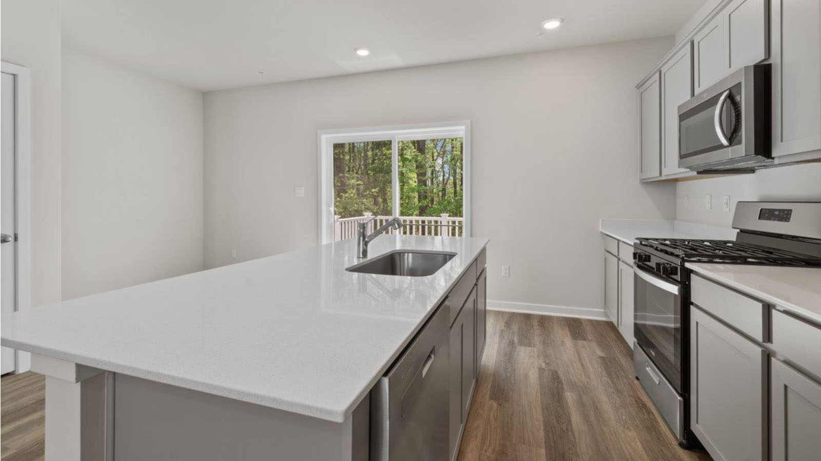 stainless steel appliances and quartz counters