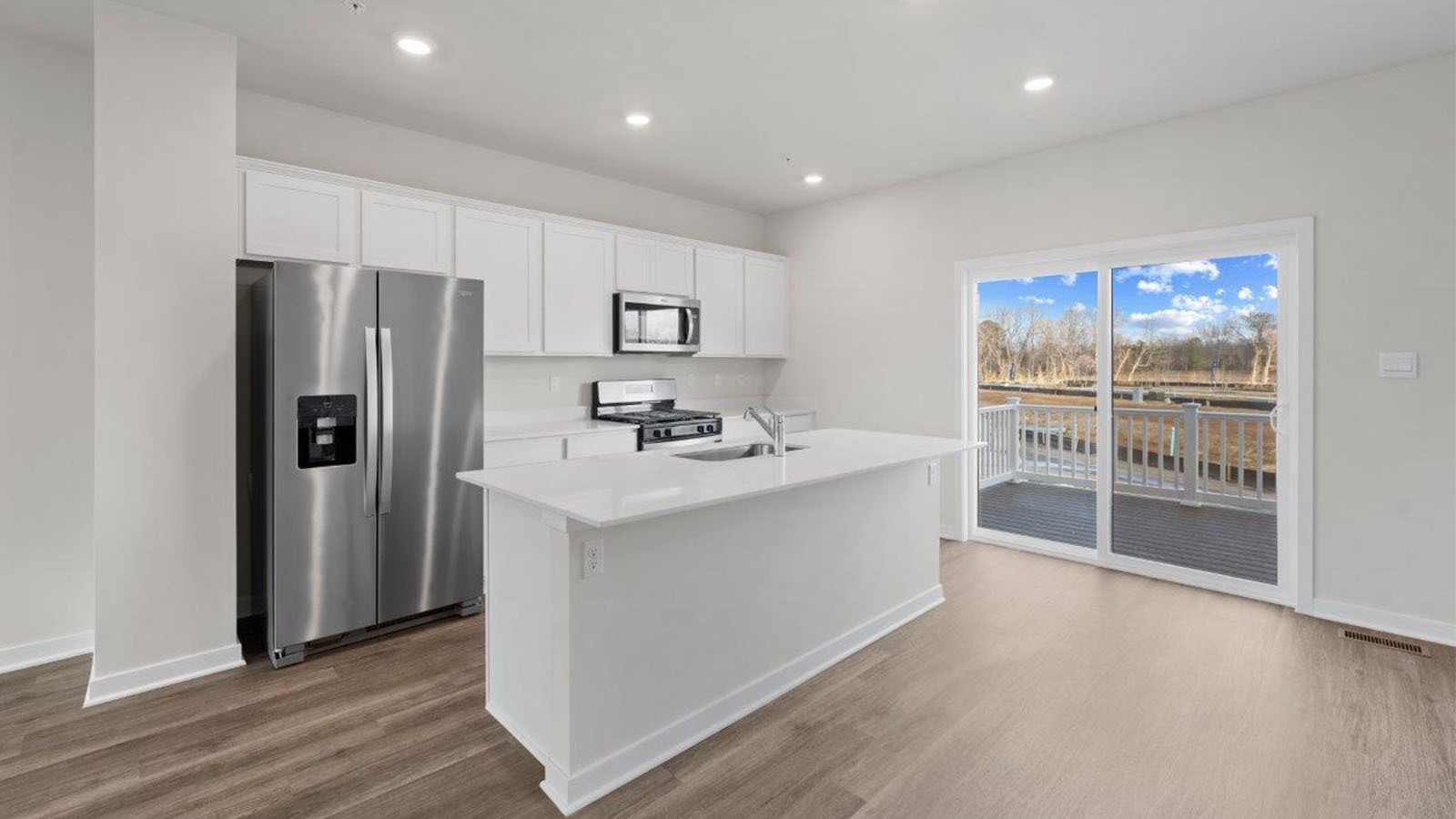 main level kitchen with white shaker cabinets