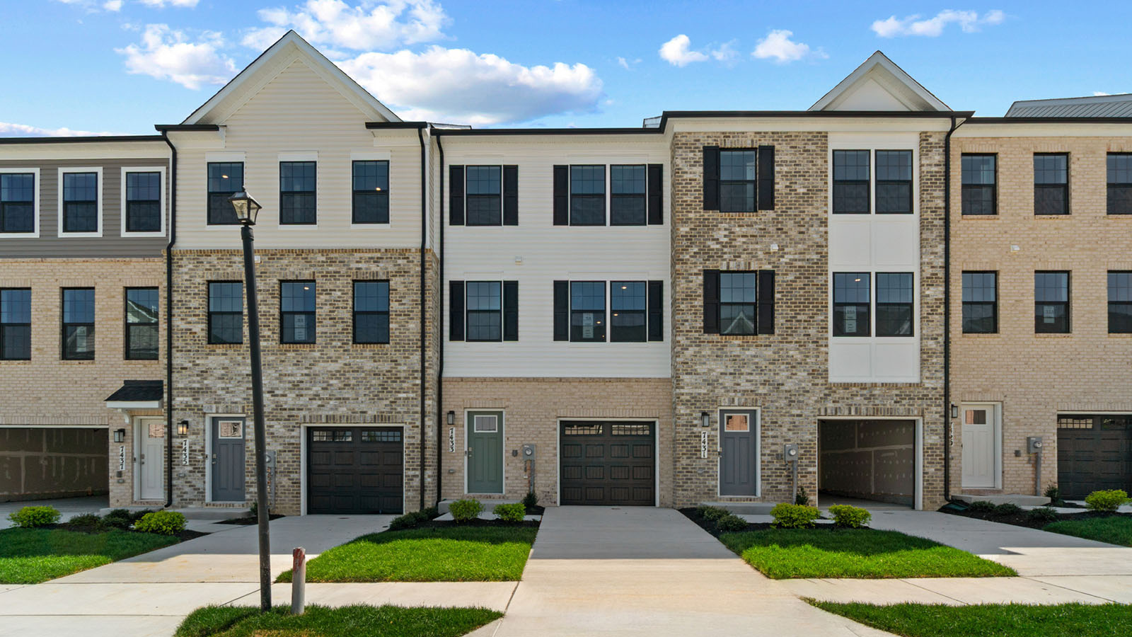 brick three story townhome