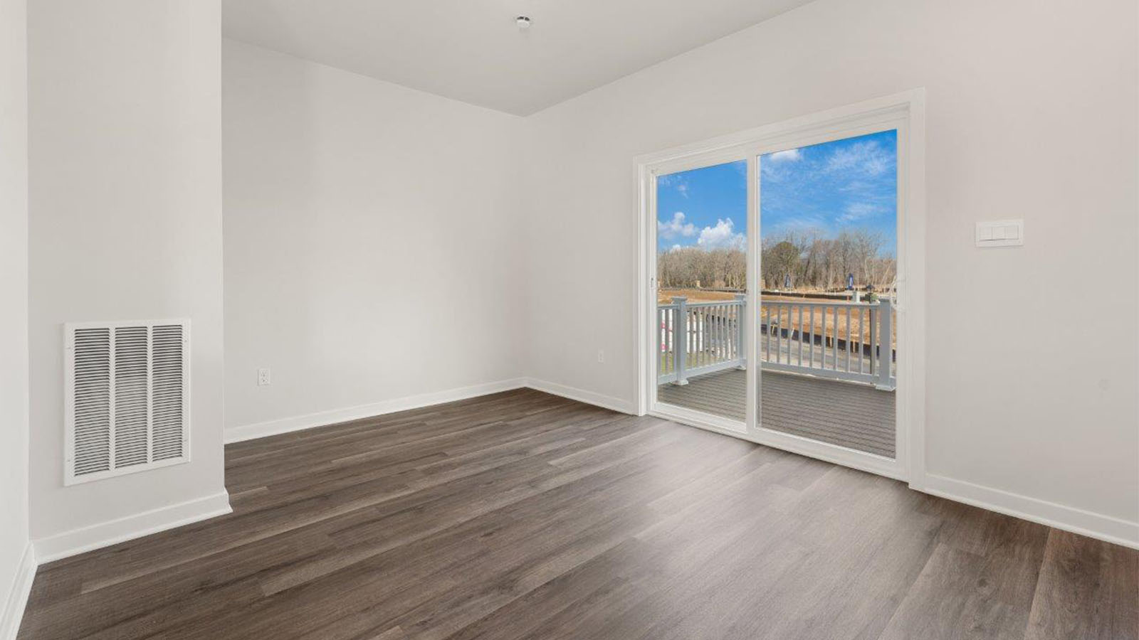 dining area leading to sliding back door