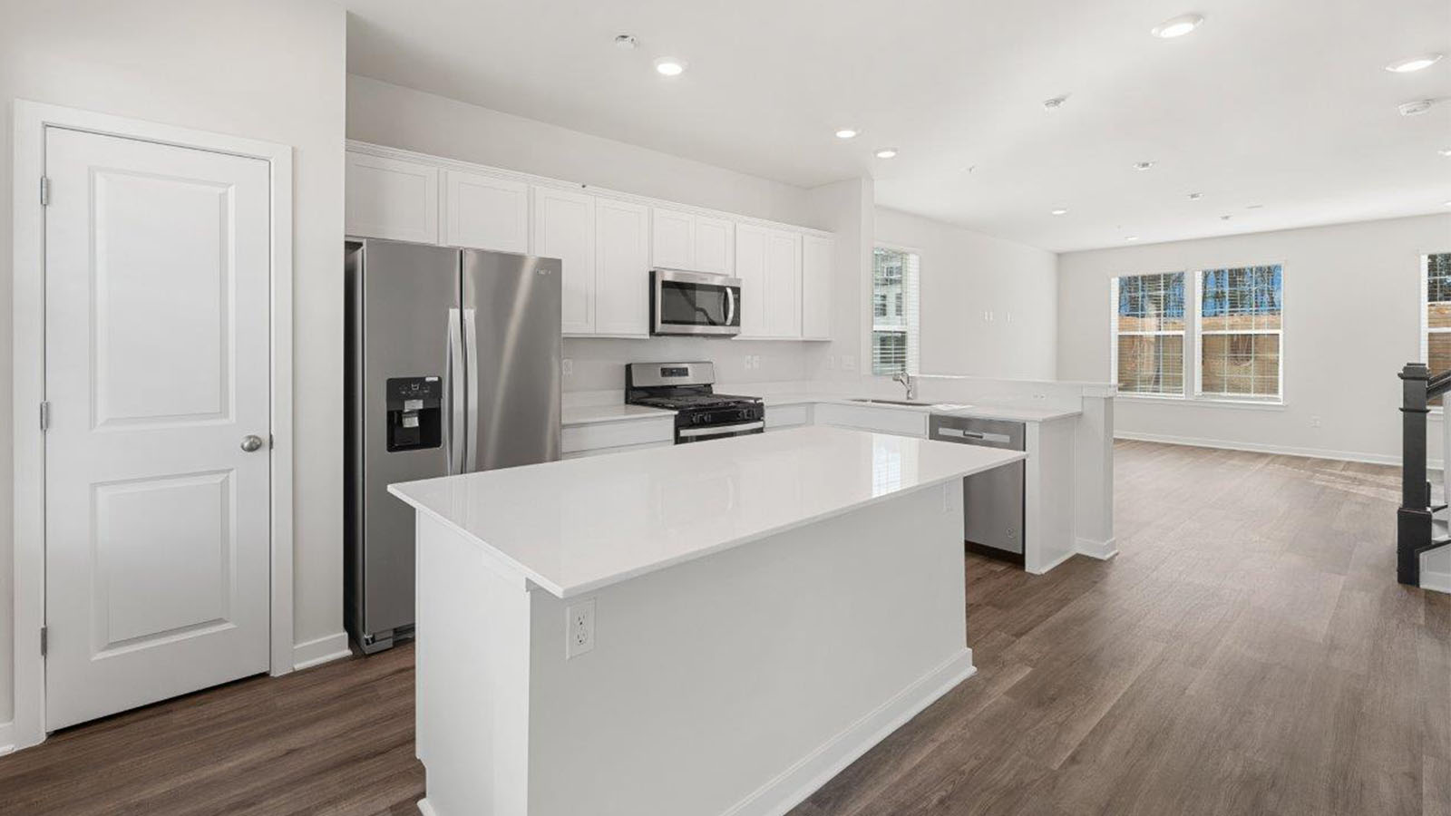 white shaker cabinets and quartz counters