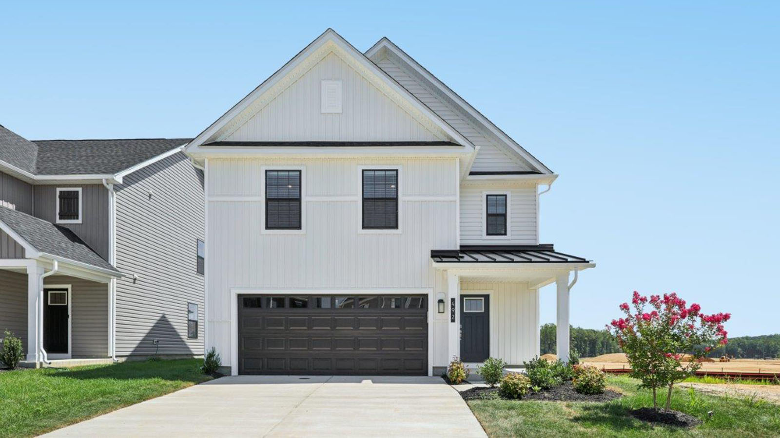 front colonial home two car garage