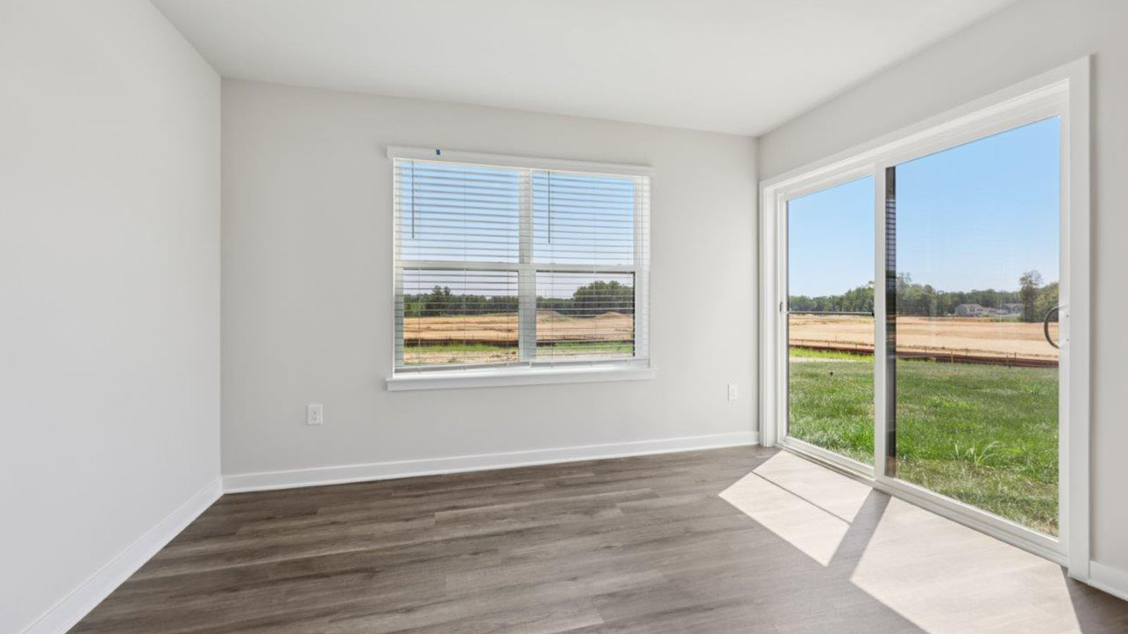 dining area leading to back sliding door