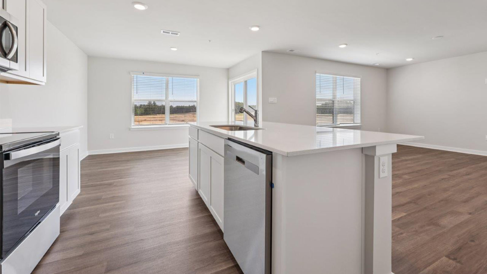 central island with sink and dishwasher